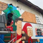 Zidurile din cartierul 23 August spun povești noi. „Satul de la marginea Capitalei”, colorat la Bucharest Street Art Festival
