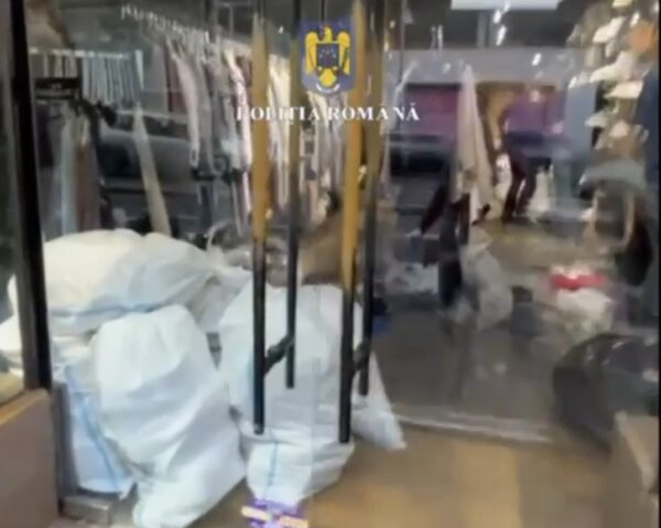 Magazin de pe Calea Victoriei care se pretindea de lux, închis de Poliţie pentru că vindea produse contrafăcute. Foto: Captură video DGPMB