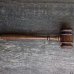 brown mallet on gray wooden surface