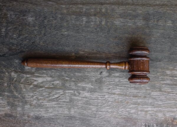 brown mallet on gray wooden surface