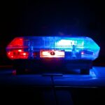 blue bmw car in a dark room