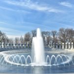 water fountain under blue sky during daytime