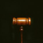 brown wooden stand with black background