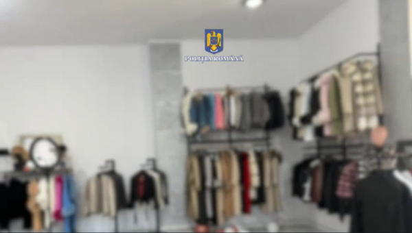 Percheziții într-un dosar de evaziune fiscală cu haine de lux FOTO: Poliția Română
